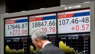 Tokyo stocks jumped on November 14 as a weaker yen lifted exporters with sentiment buoyed by upbeat Japanese GDP figures (AFP Photo/Kazuhiro Nogi)