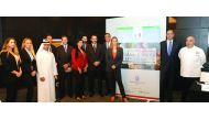 Guido De Sanctis, Italian Ambassador to Qatar; Palma Libotte, Chairperson of the Italian Chamber; and other officials at the press conference.