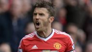 (FILES) This file photo taken on April 03, 2016 shows Manchester United's English midfielder Michael Carrick reacting during the English Premier League football match between Manchester United and Everton at Old Trafford in Manchester, north west England,