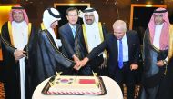 Minister of Energy and Industry H E Dr Mohammed bin Saleh Al Sada, South Korean Ambassador to Qatar Park Heung-Kyeong, and other officials cutting the cake during Korean National Day celebrations at Grand Hyatt Doha Hotel. Pic Baher Amin/ The Peninsula