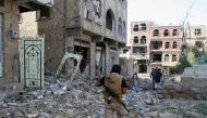 A pro-government fighter walks at the site of recent battles between Houthi fighters and pro-government fighters, on the second day of a 48-hour ceasefire in the southwestern city of Taiz, Yemen November 20, 2016. REUTERS/Anees Mahyoub