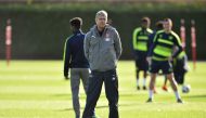 Arsenal's French manager Arsene Wenger attends a training session ahead of the UEFA Champions League group stage football match against Paris Saint Germain at Arsenal's training ground, London Colney on November 22, 2016. / AFP / GLYN KIRK
