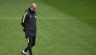 Manchester City's Spanish coach Pep Guardiola attends a training session at the City Football Academy in Manchester, northern England, on November 22, 2016.  AFP / OLI SCARFF
