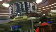 Stocks in Asia are up after a strong lead from Wall Street, where traders are betting on a possible US interest rate hike next month (AFP Photo/Isaac Lawrence)
