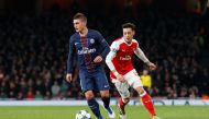 Paris Saint-Germain's Marco Verratti (L) vies with Arsenal’s Mesut Ozil (R) during Champions League Group A match between Arsenal FC and Paris Saint-Germain FC at Emirates Stadium on November 23, 2016 in London, United Kingdom. ( Tolga Akmen - Anadolu Age