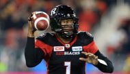 Quarterback Henry Burris #1 of the Ottawa Redblacks throws a pass during the second half of the 104th Grey Cup Championship Game against the Calgary Stampeders at BMO Field on November 27, 2016 in Toronto, Canada. Vaughn Ridley/Getty Images/AFP