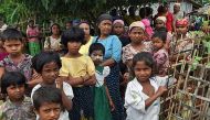 Rohingya Muslims gather inside the Thet Kay Pyin internally displaced persons camp during a visit by former U.N. chief Kofi Annan (not pictured) in Sittwe, western Myanmar's Rakhine state, Sept. 7, 2016.
