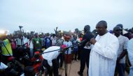 The United Democratic Party (UDP), opposition alliance presidential candidate Adama Barrow speaks during a rally in Buffer zone, Gambia November 29, 2016. REUTERS/Thierry Gouegnon