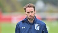(FILES) This file photo taken on November 14, 2016 shows England interim manager Gareth Southgate as he leads a training session at Tottenham's training ground in north London, ahead of their international friendly football match against Spain. AFP / OLLY