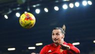 Manchester United's Zlatan Ibrahimovic jumps to cross the ball during their League Cup match against West Ham United at Old Trafford in Manchester, England, on Wednesday.
