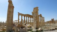 The remains of the Arch of Triumph in Palmyra after it was destroyed by the Islamic State group in Syria (AFP Photo/Maher AL MOUNES).