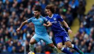 Manchester City's Sergio Aguero in action with Chelsea's David Luiz. Reuters / Jason Cairnduff 
