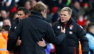 Bournemouth manager Eddie Howe and assistant Jason Tindall shake hands with Liverpool manager Juergen Klopp after the game Reuters / Eddie Keogh  

