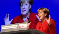 German Chancellor Angela Merkel addresses delegates during her conservative Christian Democratic Union (CDU) party's congress in Essen, western Germany, on December 6, 2016.  AFP / TOBIAS SCHWARZ
