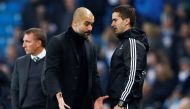  Manchester City manager Pep Guardiola speaks with an official Reuters / Jason Cairnduff