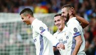 Real Madrid's Karim Benzema (right) celebrates with Cristiano Ronaldo (left) after scoring a goal against Borussia Dortmund during their UEFA Champions League match at Santiago Bernabeu Stadium in Madrid, Spain on Wednesday.