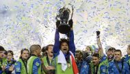 Seattle Sounders defender Roman Torres (29) lifts the Philip F. Anschutz Trophy with his teammates after they defeated Toronto FC in the 2016 MLS Cup at BMO Field. Geoff Burke-USA TODAY Sports