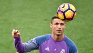 Real Madrid's Portuguese forward Cristiano Ronaldo heads a ball during a training session at Valdebebas training ground in Madrid on December 9, 2016, on the eve of the Spanish League match Real Madrid CF vs RC Deportivo de La Coruna. / AFP / GERARD JULIE