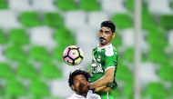 El Jaish's Romarinho (front) vies for the ball pocession with Al Ahli player during a Qatar Stars League match played at Al Ahli Stadium in this file photo. 