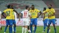 Delhi Dynamos FC forward Marcelo Leite Pereira (C/L) argues with Kerala Blasters FC forward Duckens Nazon (C/R) during the second leg of the second semi-final Indian Super League (ISL) football match between Delhi Dynamos FC and Kerala Blasters FC at The 