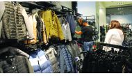 Customers checking winter clothes at a shop in Ezdan Mall yesterday. The demand for winter wear has gone up with the mercury continuing to fall in Qatar. 
Pic: Kammutty V P / The Peninsula