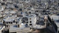 Damaged buildings are seen in the Darat Izza district of Aleppo as the civil war continues in Syria on December 18, 2016. As a result of air attacks from warplanes belonging to the Assad regime, the Darat Izza, a district in western Aleppo that normally h