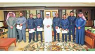 Chairman of the General Authority of Customs, Ahmed bin Ali Al Mohannadi, with employees who were honoured for seizing narcotics.
