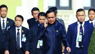 Thailand's Prime Minister Prayuth Chan-ocha arrives at a weekly cabinet meeting at Government House in Bangkok, yesterday.