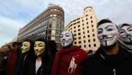 FILE PHOTO: Masked Lebanese protesters taking part in a demonstration against the on-going trash crisis and government corruption in downtown Beirut on March 12, 2016. (AFP / ANWAR AMRO) 
