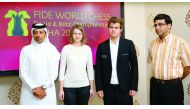 Qatar Chess Association General Secretary Mohammed Al Medaikhi, Slovenian Grandmaster Anna Muzychuk, World Chess Champion Magnus Carlsen and Former world champion Viswanathan Anand pose for a photograph during a press conference in Doha yesterday.