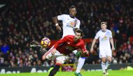 Manchester United's Henrikh Mkhitaryan strikes the ball with the back of his heel to score a goal against Sunderland during their Premier League match at Old Trafford in Manchester, England, on Monday.