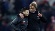 Liverpool manager Juergen Klopp celebrates with Adam Lallana at the end of the match Reuters / Darren Staples 