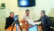 Philippine Consul General Roussel R Reyes (centre) with UFOQ Chairman Ressie S Fos (right) and GMA 7 correspondent Manny Flores at the UFOQ Teleradyo show. 