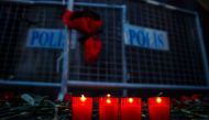 Carnations and candles are placed at site to pay tribute to victims of Istanbul night club terror attack in Istanbul, Turkey on January 01, 2017. (Arif Hüdaverdi Yaman/Anadolu Agency)