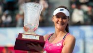Poland's Agnieszka Radwanska claimed her 18th WTA title after winning the Shenzhen Open. / AFP.