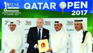 Andreas Pfister (second left), General Manager of InterContinental Doha and Fahad Nasser Al Naimi, General Secretary of Qatar Golf Association (QGA) exchange documents after signing an agreement at Doha Golf Club yesterday. Mohammed Faisal Al Naimi, Execu