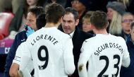 New Swansea City manager Paul Clement speaks to Fernando Llorente and Gylfi Sigurdsson during the game Reuters / Eddie Keogh 
