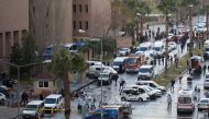 Police forensic experts examine the scene after an explosion outside a courthouse in Izmir, Turkey, January 5, 2017. REUTERS/Tuncay Dersinlioglu
