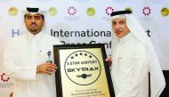 Akbar Al Baker (right), Qatar Airways Group Chief Executive, and Engineer Badr Mohammed Al Meer, COO of  Hamad International Airport (HIA), with the 5-Star Airport Skytrax certificate at HIA, yesterday. 