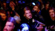Fans of the late George Michael wear masks at a tribute night event, in London, Britain, January 6, 2017. REUTERS/Peter Nicholls

