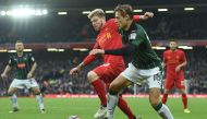 Plymouth's English midfielder Oscar Threlkeld vies with Liverpool's Spanish defender Alberto Moreno (2nd L) during the English FA Cup third round football match between Liverpool and Plymouth Argyle at Anfield in Liverpool, north west England on January 8