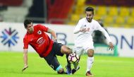 Action from the Qatar Stars League match between Al Rayyan and Umm Salal yesterday. Al Rayyan won 1-0 with Sergio Garcia scoring in the 51st minute. 