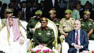 Minister of State for Defence Affairs H E Dr Khalid bin Mohamed Al Attiyah with Sudanese President Omar Hassan Al Bashir and Turkey's Defence Minister Fikri Isik in Khartoum, Sudan, yesterday.
