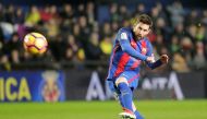 Barcelona's Lionel Messi shoots to score. (REUTERS/Heino Kalis)