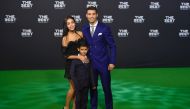 Real Madrid and Portugal's forward Cristiano Ronaldo poses with partner Georgina Rodriguez and his son Cristiano Ronaldo Jr as they arrive for The Best FIFA Football Awards 2016 ceremony, on January 9, 2017 in Zurich. (AFP / MICHAEL BUHOLZER)