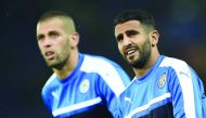 Leicester City's Islam Slimani (left) and Riyad Mahrez as they warm UP at the King Power Stadium in Leicester, central England in this October 18, 2016 file photo. 