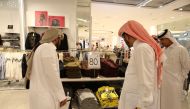 Ministry officials inspect the products for misleading offers at various malls during Shop Qatar Festival 
