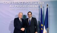 Foreign Minister H E Sheikh Mohammed bin Abdulrahman Al Thani with French Foreign Minister Jean-Marc Ayrault in Paris yesterday.