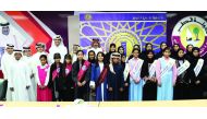 Officials of Education Excellence Awards, Dr Hamda Al Sulaiti, Chairperson, Development Committee, Ministry of Education and Higher Education; and Hassan Al Mohammadi, Chairman, Executive Committee, and Director, Public Relations at the Ministry, pose wit