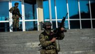 Turkish special forces stand guard at the entrance of the courthouse on January 23, 2017 at Silivri district in Istanbul. Trial starts of soldiers accused of trying to block Istanbul's Sabiha Gokcen airport during the failed coup of July 2016. / AFP / YAS
